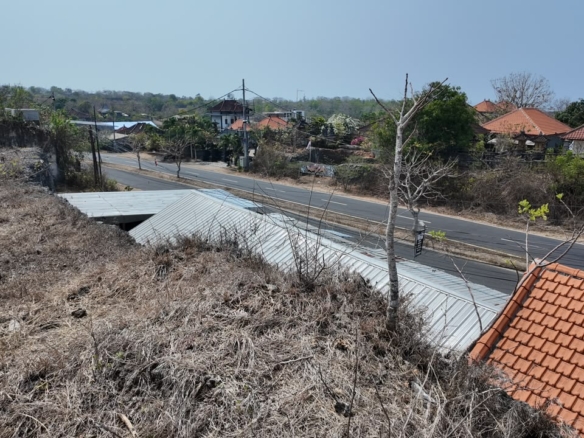 Road past a land plot in Kutuh, Kecamatan Kuta Selatan, Bali